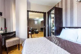 Отель: Cityhome Aparthotel